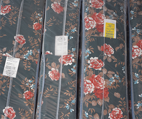 mattresses stacked horizontally